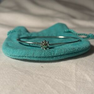 Tiffany Paloma Picasso Jolie daisy bangle bracelet with 18k yellow gold center